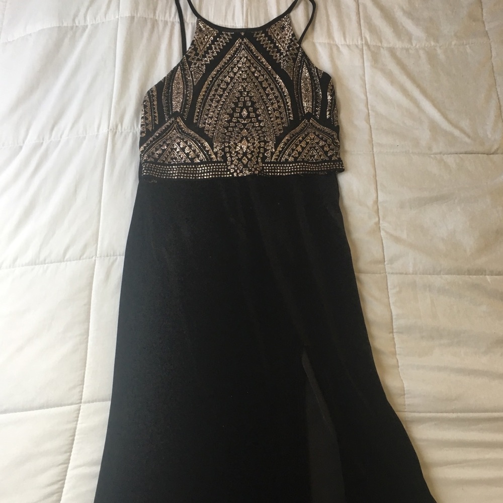 Black and gold prom dress with slit